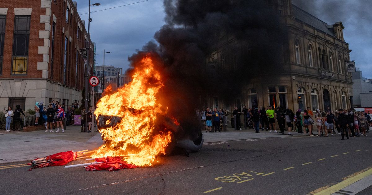 A demonstration takes place in Sunderland city centre during which a car and a police station were set alight