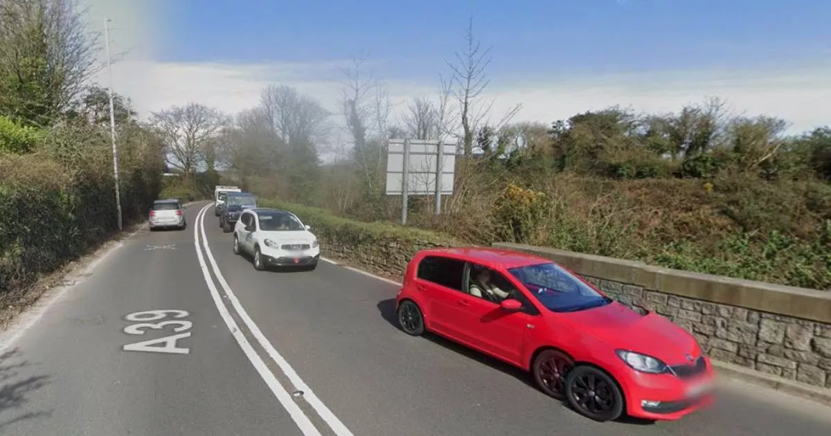 The A39 is blocked following a two-vehicle crash near Penryn